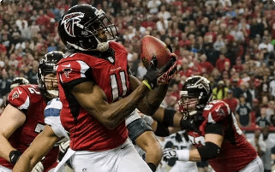 Julio Jones catching a pass in a Falcons uniform — example of an elite receiver with injury history